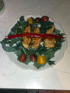 A picture of Sauteed chicken breast in tamarind habanero reduction sauce.