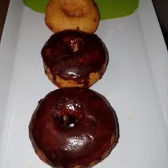 A picture of Chocolate glazed Donuts🍩🍩🥯.