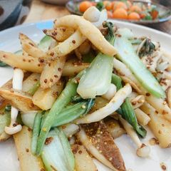 A picture of Potato, mushroom and bok-choy sauté with mustard sauce.