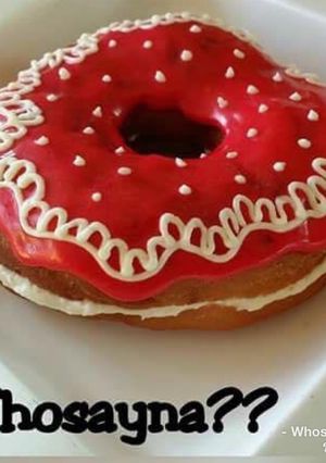A picture of Whosayna’s Donuts filled with Custard Creame.