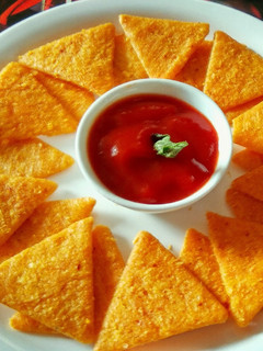 A picture of Raw mango Tortilla chips.