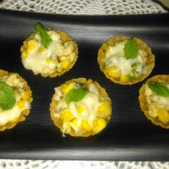 A picture of Cheesy Corn Canapés.