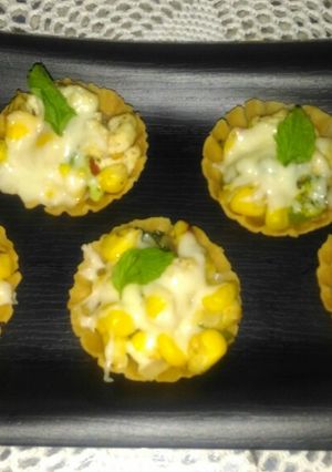 A picture of Cheesy Corn Canapés.