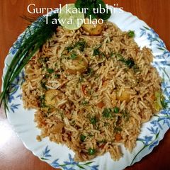 A picture of Tawa pulao 🍚🍅🧅.
