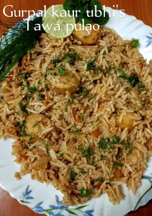 A picture of Tawa pulao 🍚🍅🧅.