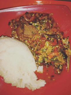 A picture of Okro soup with white garri.