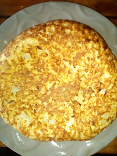 Una foto de Tortilla de quinoa con papa y coliflor