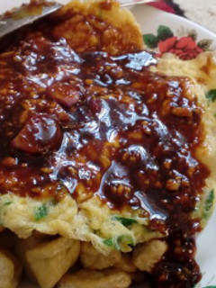 A picture of Fried Tofu and Egg w/ Peanut Sauce (Tahu Tek).