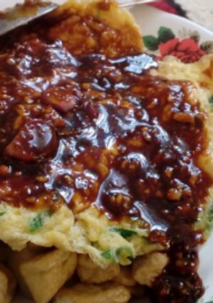 A picture of Fried Tofu and Egg w/ Peanut Sauce (Tahu Tek).