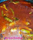 Anchovy mud pot fish curry