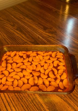 A picture of Instant pot /orange Jell-O with mandarin oranges.