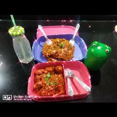A picture of Veg Manchurian and chow mein.