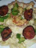 Gnocchi con gamberoni zucchine stracciatella pugliese e pomodori