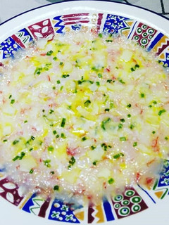 Una foto de Carpaccio de gambas con parmesano
