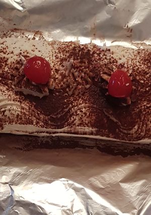 Una foto de Brazo de falso tiramisú