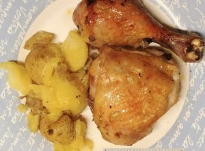 Foto principal de Pollo al horno con patatas machacadas