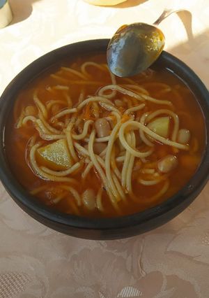Una foto de Porotos en olla de greda 🤤