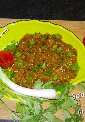 A picture of (Brinjal)Baigan ka Bharta in Green Onions.