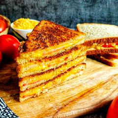 A picture of Cheese and Tomato Grilled Sandwich.