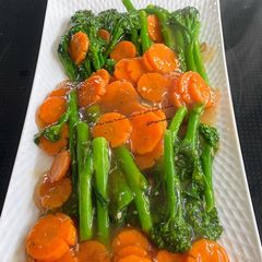 A picture of Stir Fried Baby Broccoli & Carrot With Oysters Sauce.