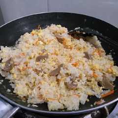 A picture of 🍚Nasi goreng 🥕carrot x meat ball🥚.