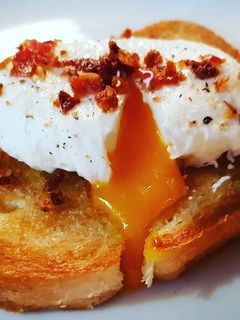A picture of Poached Egg with Bacon.