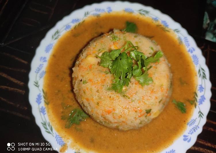 Plate Vegetables Idli and Rasam Chutney ๐