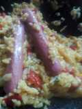 Risotto primavera con salchichas
