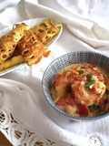 Gamberoni al curry con roti jala