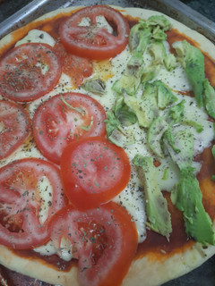 Una foto de Pizza casera😋😋