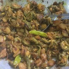 A picture of Bitter gourd Potatoes Bhaji.