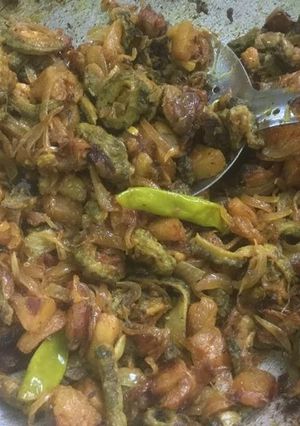 A picture of Bitter gourd Potatoes Bhaji.