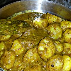 A picture of Dum aloo with roasted masala.
