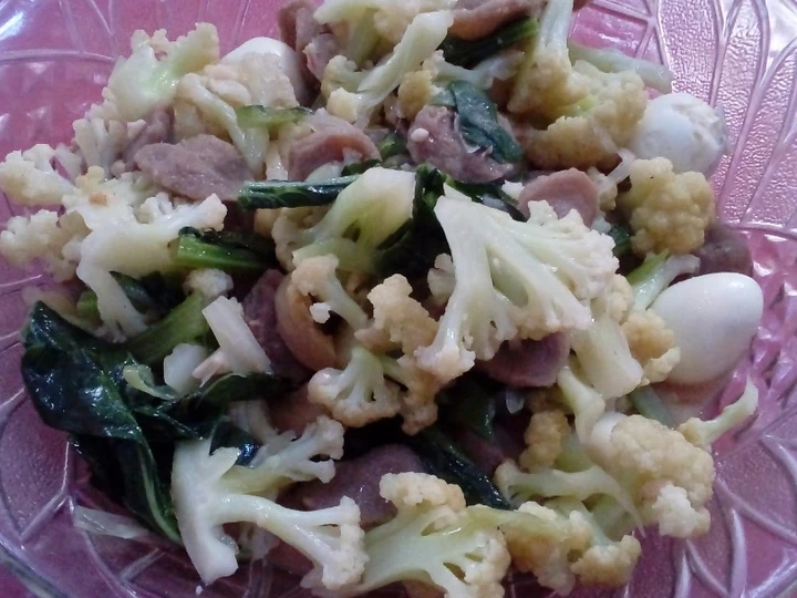 Easy Steps Prepare Recipes Stir fry cauliflower saussages and quail eggs the  Makes Drooling Really Delicious.
