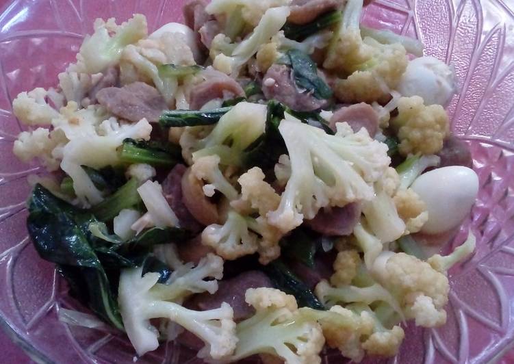 Recipe of Perfect Stir fry cauliflower saussages and quail eggs