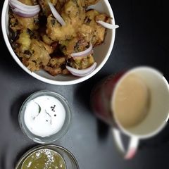 A picture of Ulli vada (food snack of kerelian popular street food.).