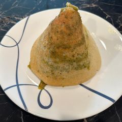 A picture of Spinach mint cauliflower masala dosa.