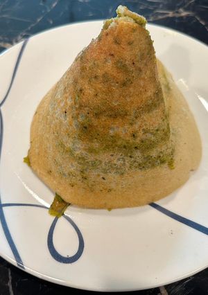 A picture of Spinach mint cauliflower masala dosa.