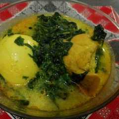 A picture of Daun singkong bumbu kuning.