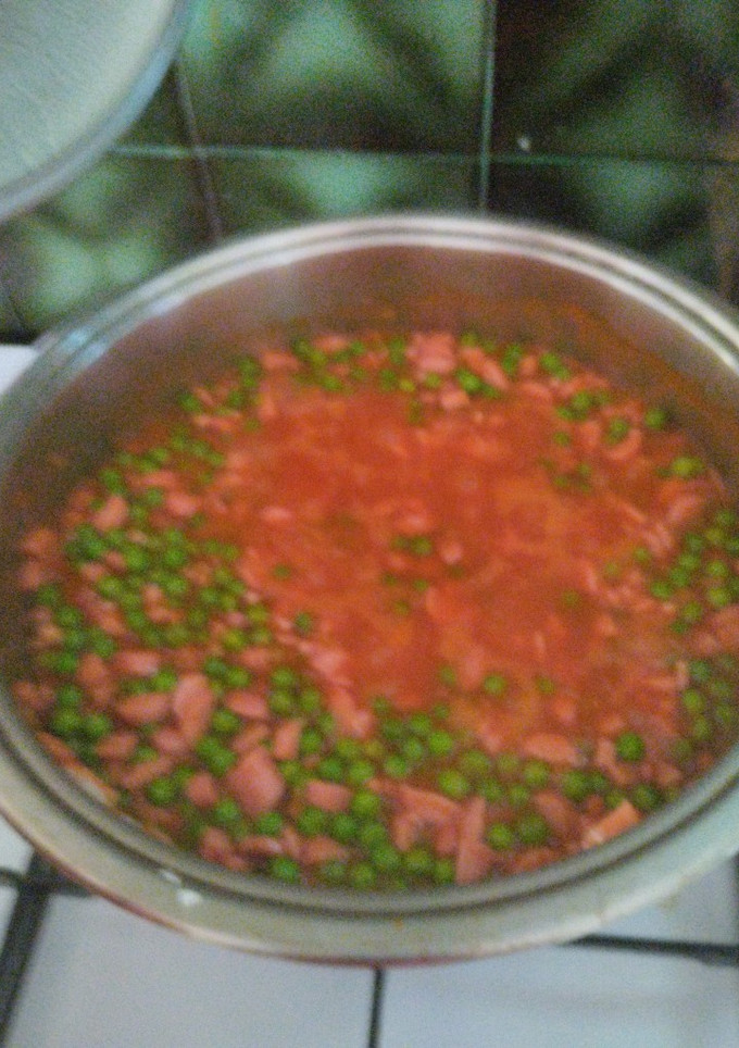 Una foto de Arvejas Mirqueras con tomate