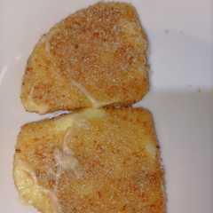 Una foto de Milanesas de queso provolone
