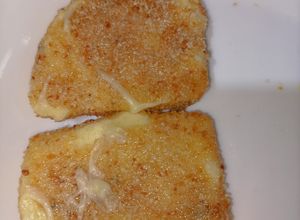 Una foto de Milanesas de queso provolone