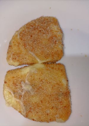 Una foto de Milanesas de queso provolone