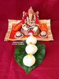 Ukadiche Modak - Steamed Rice Flour Dumplings Stuffed With Coconut Jaggery Sweet Mixture