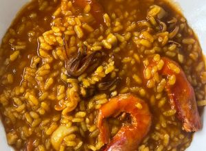 Foto principal de Arroz meloso con gamba roja y calamar