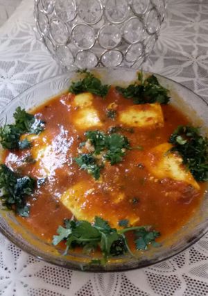 A picture of Paneer masala with tomato gravy.