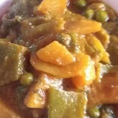 A picture of Sim aloo or motor tortari(flat beans,peas and potato curry).
