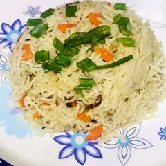 A picture of Carrots pulao.