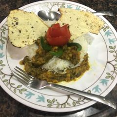A picture of Sindhi saibhaji chawal (dal palak).