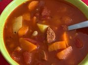 A picture of white beans and pork